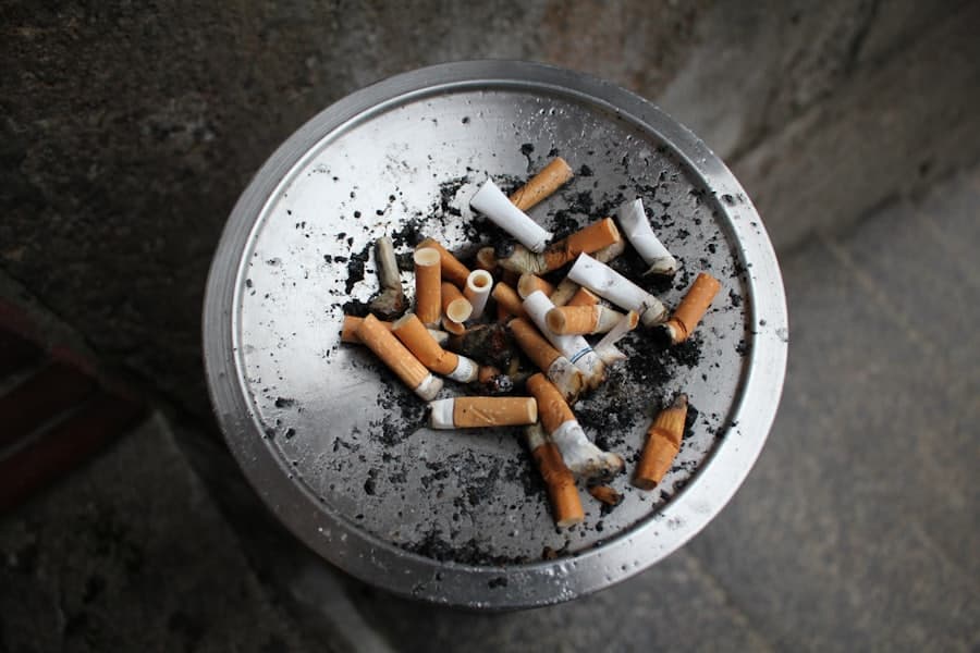 A cigarette resting in an ashtray